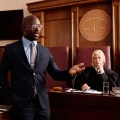 What is a lawyer who represents the government in criminal cases?